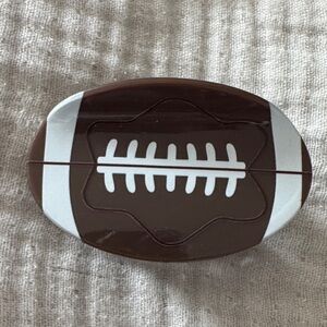Brown Football-Shaped Container